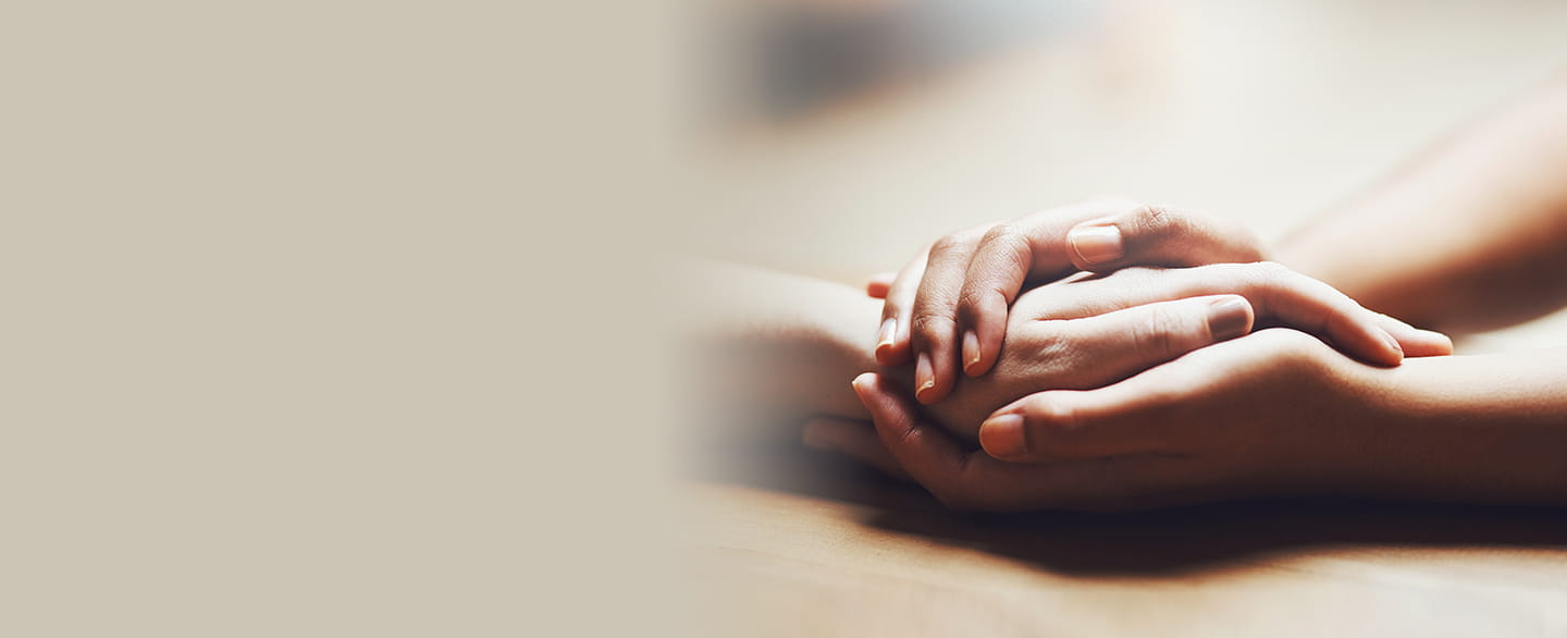 Holding someones hand showing care and compassion.