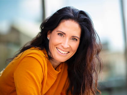 Beautiful woman smiling at the camera