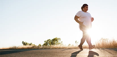 A jogger at sunrise